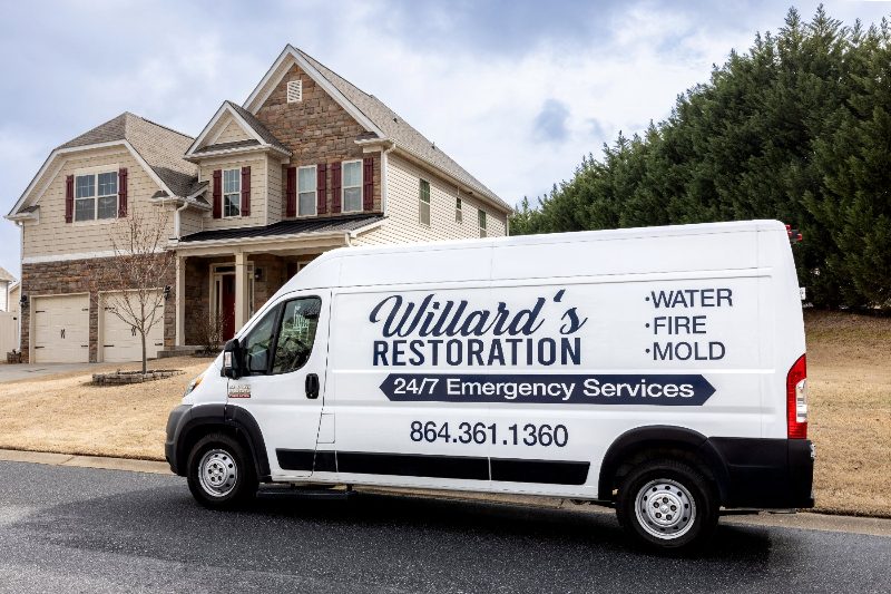The Willard's Restoration van outside a home in the Upstate